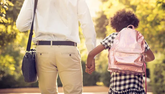 father and daughter going to school