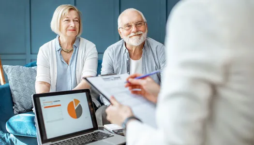 retired couple getting financial counseling