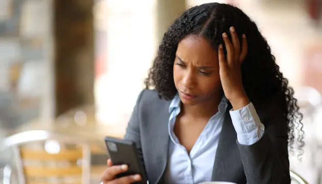 frustrated woman on phone