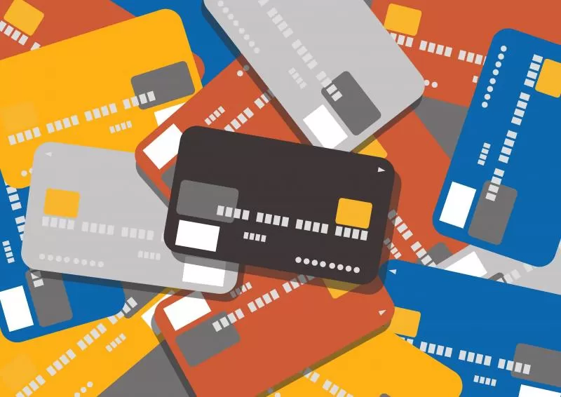 Mixed pile of credit cards, symbolizing disputing credit report errors, toolbox for consumers 
